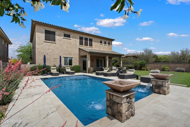 view of swimming pool with an outdoor living space with a fire pit, a patio, a fenced backyard, and a fenced in pool