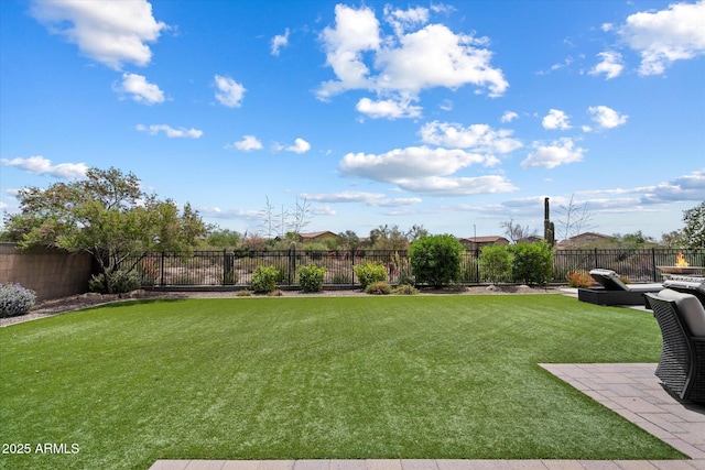 view of yard featuring a fenced backyard