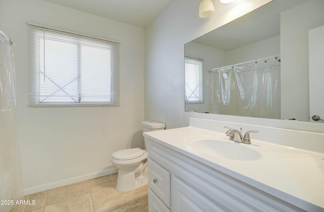 bathroom with toilet, tile patterned flooring, vanity, and curtained shower