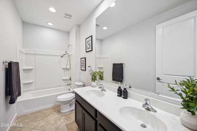 full bathroom featuring tile patterned floors, vanity, toilet, and tub / shower combination