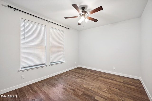 unfurnished room with ceiling fan and hardwood / wood-style flooring