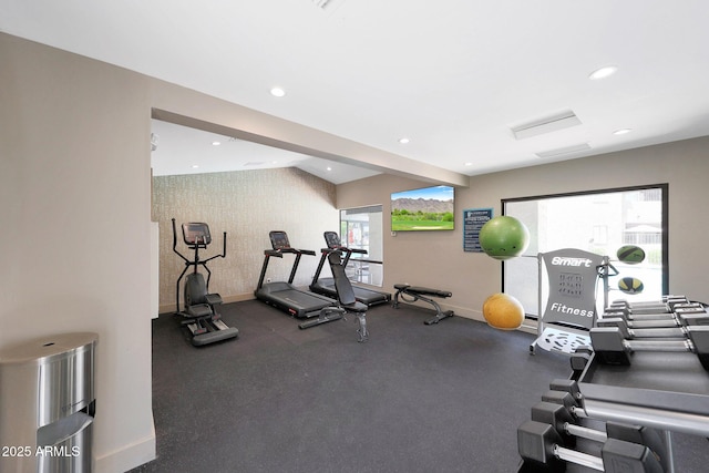 workout area with baseboards and recessed lighting
