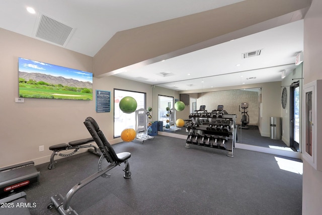 exercise room with lofted ceiling, baseboards, and recessed lighting
