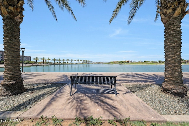 view of community with a water view