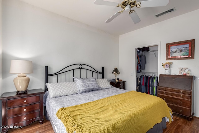16331 W Tierra Way, Surprise, AZ 85374 - bedroom with a spacious closet, wood finished floors, a closet, and visible vents