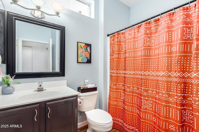 16331 W Tierra Way, Surprise, AZ 85374 - bathroom featuring toilet, vanity, and a shower with shower curtain