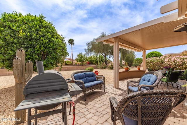 16331 W Tierra Way, Surprise, AZ 85374 - view of patio featuring an outdoor living space and fence