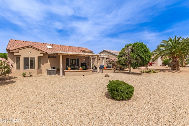 16331 W Tierra Way, Surprise, AZ 85374 - back of property with a tile roof, stucco siding, and a patio area