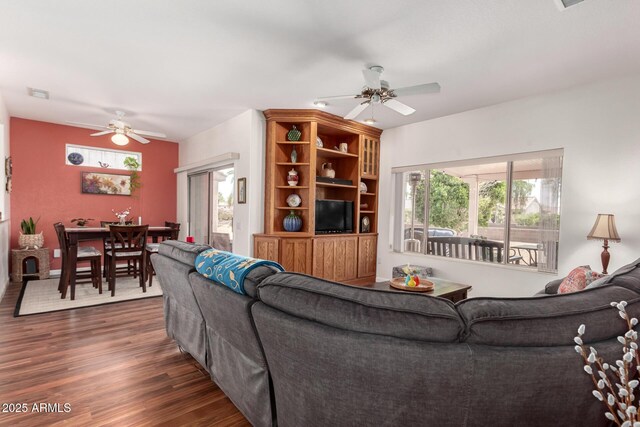 16331 W Tierra Way, Surprise, AZ 85374 - living area featuring a ceiling fan, dark wood-type flooring, and visible vents