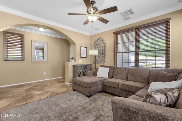 3828 S Verbena Ave, Gilbert, AZ 85297 - living room featuring crown molding, ceiling fan, arched walkways, baseboards, and visible vents