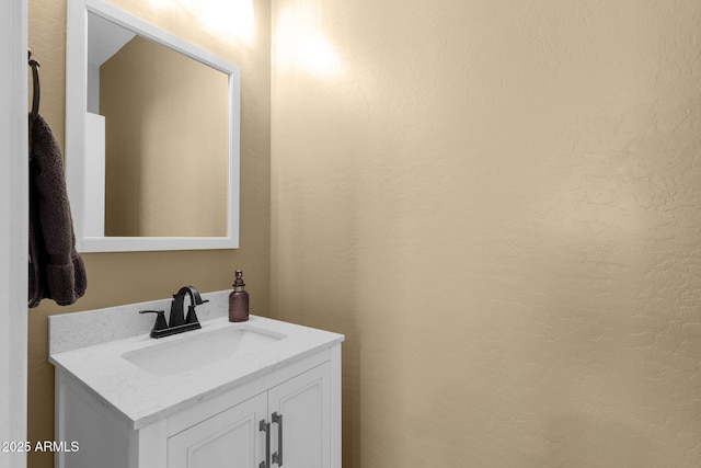 3828 S Verbena Ave, Gilbert, AZ 85297 - bathroom with a textured wall and vanity