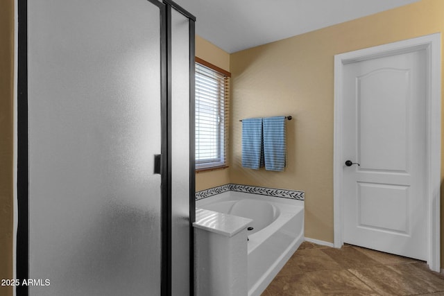 3828 S Verbena Ave, Gilbert, AZ 85297 - bathroom featuring tile patterned floors, a shower stall, and a bath