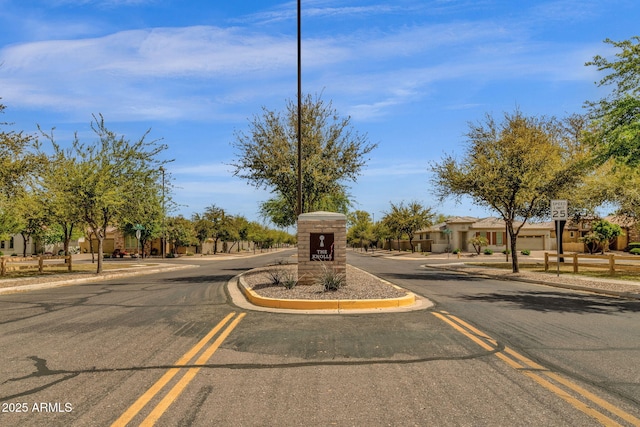 3828 S Verbena Ave, Gilbert, AZ 85297 - view of road with curbs, traffic signs, and sidewalks