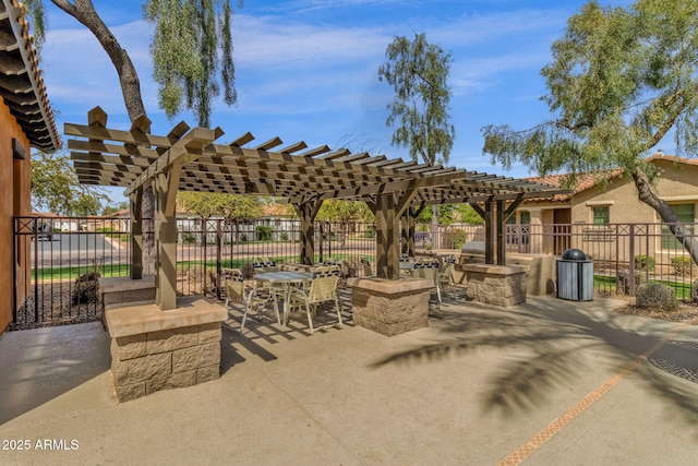 3828 S Verbena Ave, Gilbert, AZ 85297 - view of patio / terrace featuring a pergola, exterior kitchen, fence, and outdoor dining area