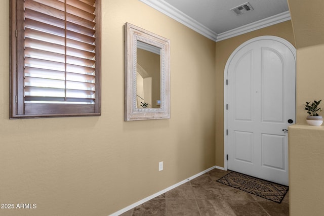 3828 S Verbena Ave, Gilbert, AZ 85297 - foyer entrance featuring visible vents, baseboards, crown molding, and tile patterned flooring