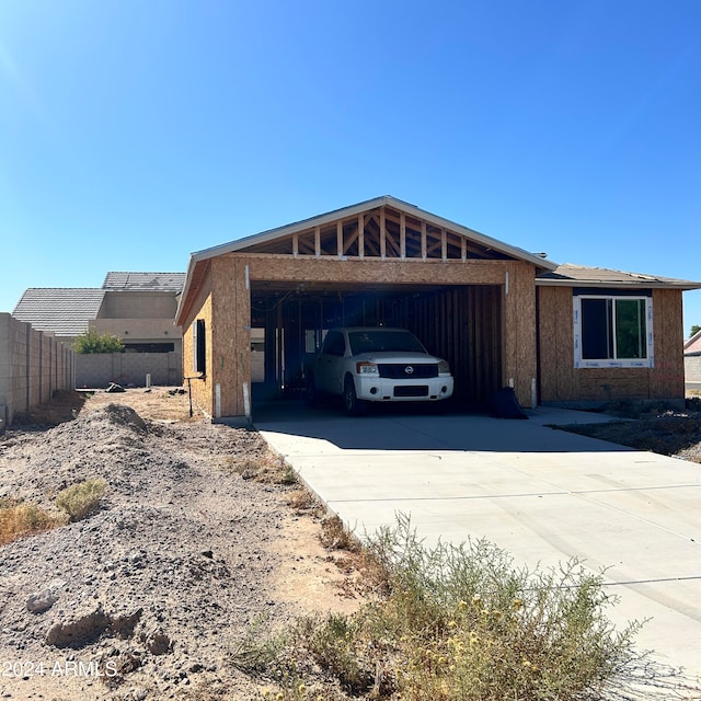 view of home's exterior with a carport