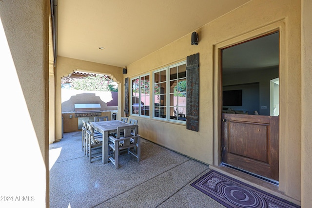 view of patio / terrace featuring outdoor dining space and area for grilling