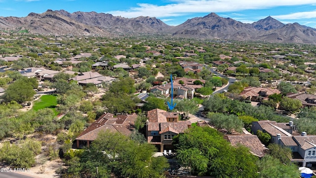 aerial view featuring a mountain view and a residential view