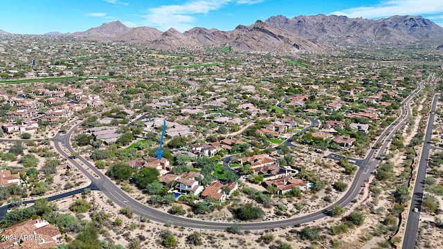 drone / aerial view featuring a residential view and a mountain view