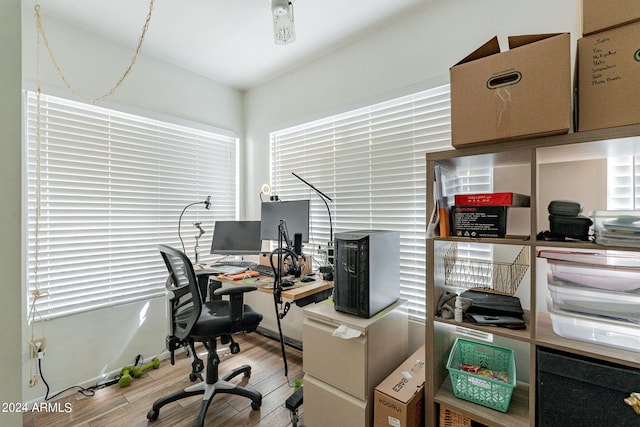 home office featuring light hardwood / wood-style floors