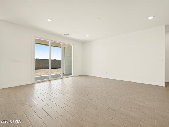 4035 S 176th Dr, Goodyear, AZ 85338 - spare room with recessed lighting and wood finished floors