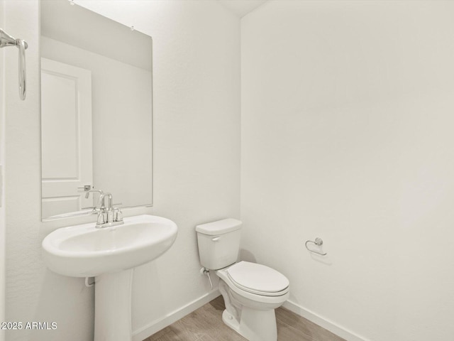 4035 S 176th Dr, Goodyear, AZ 85338 - half bathroom with wood finished floors and baseboards