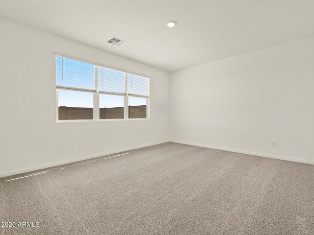 4035 S 176th Dr, Goodyear, AZ 85338 - spare room featuring carpet and recessed lighting