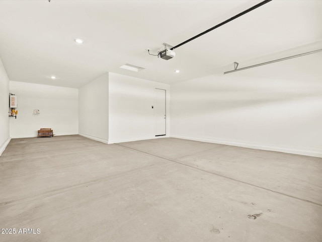 4035 S 176th Dr, Goodyear, AZ 85338 - garage featuring a garage door opener and recessed lighting