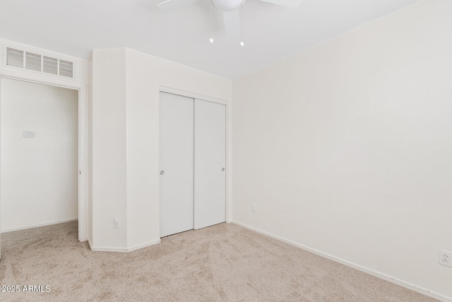 2286 E Mohave Ln, Apache Junction, AZ 85119 - unfurnished bedroom with carpet floors, a closet, baseboards, and a ceiling fan