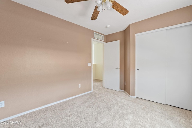 2286 E Mohave Ln, Apache Junction, AZ 85119 - unfurnished bedroom featuring carpet flooring, a closet, baseboards, and a ceiling fan