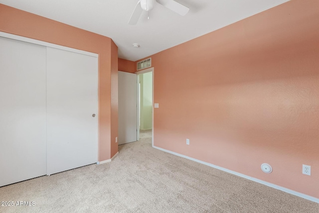 2286 E Mohave Ln, Apache Junction, AZ 85119 - unfurnished bedroom featuring carpet floors, a closet, baseboards, and ceiling fan