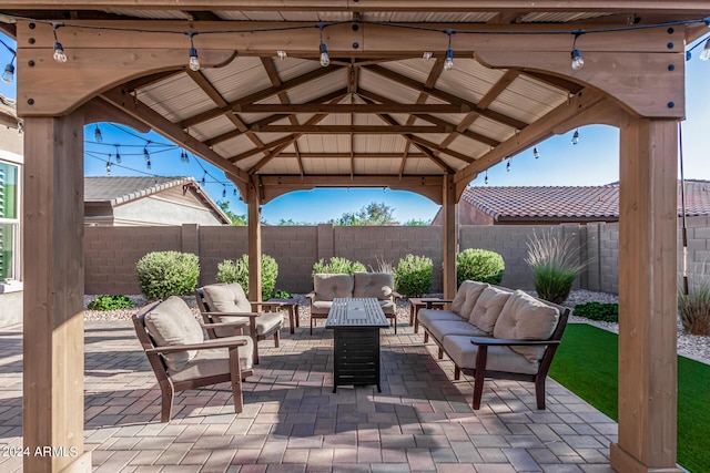 view of patio featuring a gazebo and outdoor lounge area