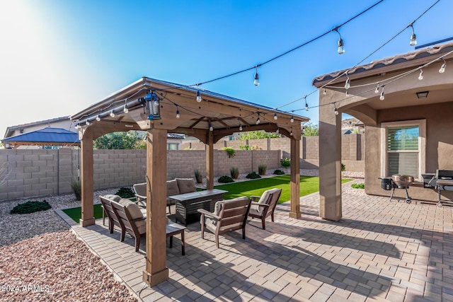 view of patio featuring a gazebo and outdoor lounge area