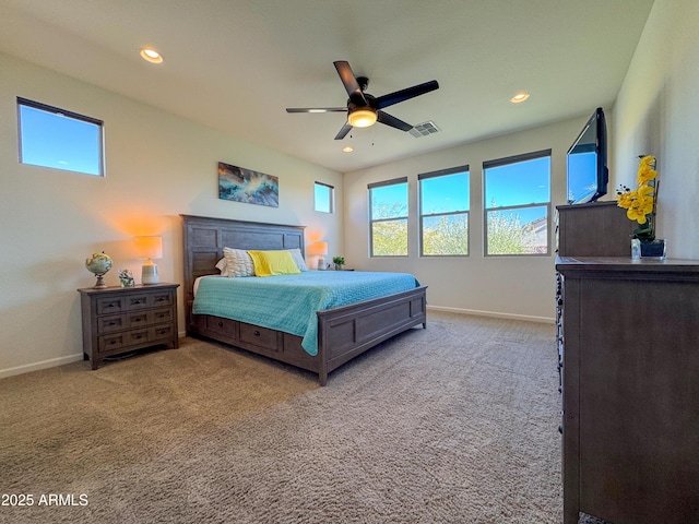 carpeted bedroom with ceiling fan