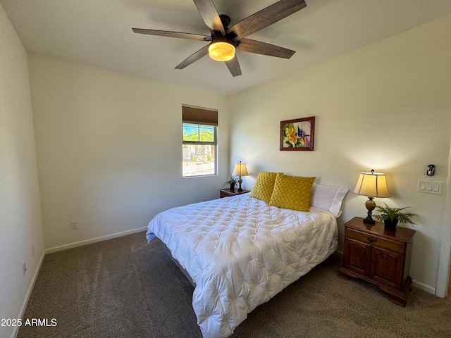 bedroom featuring ceiling fan and carpet