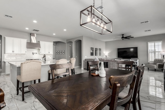 dining room with ceiling fan