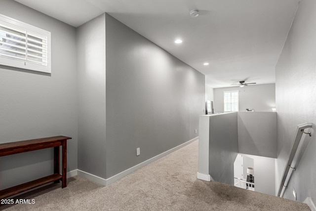 corridor with carpet floors