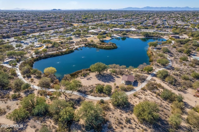 bird's eye view with a water and mountain view