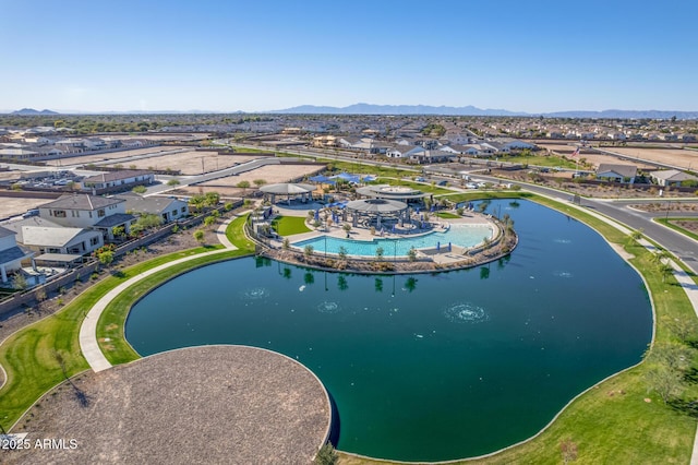 bird's eye view featuring a water and mountain view