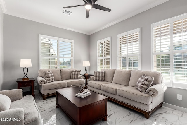 living room featuring ceiling fan and ornamental molding