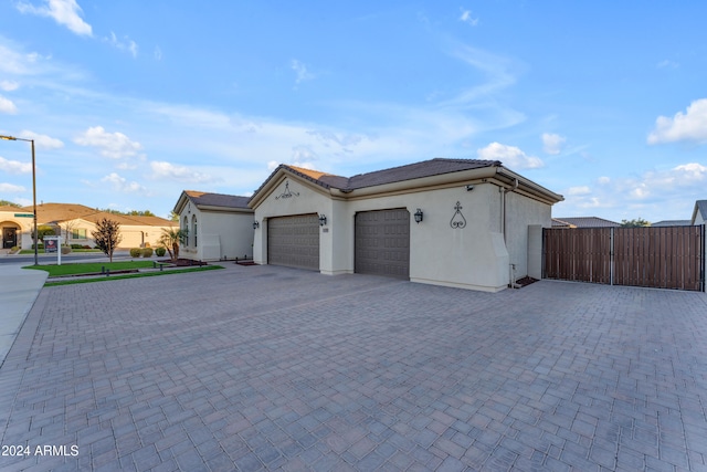 view of front of property featuring a garage