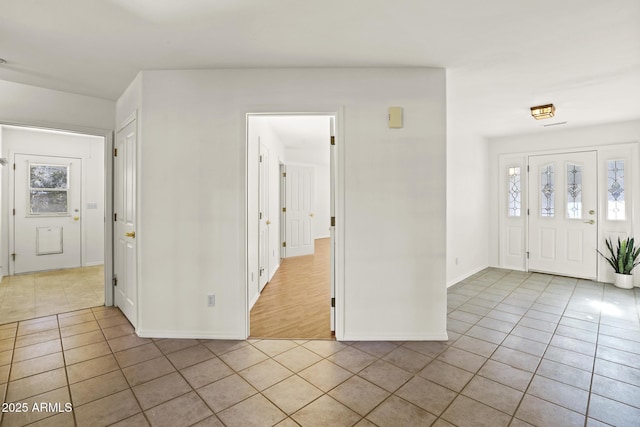 view of tiled foyer entrance