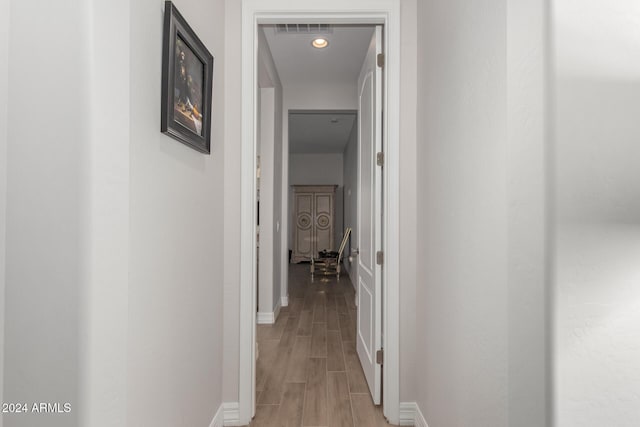 hallway with light wood-type flooring