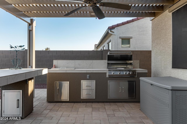 view of patio / terrace featuring a grill and ceiling fan