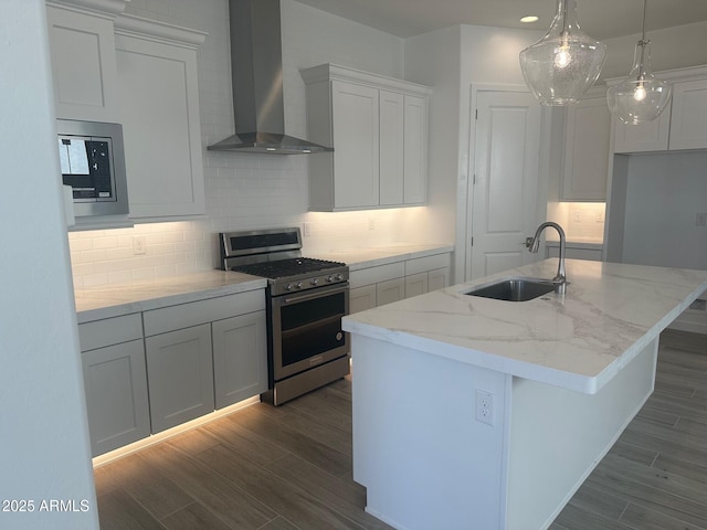 3637 E Rochelle Cir, Mesa, AZ 85213 - kitchen featuring appliances with stainless steel finishes, wall chimney range hood, a sink, and backsplash