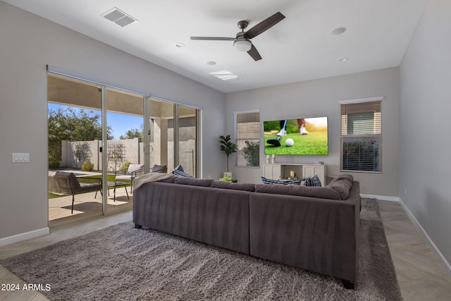 living room featuring ceiling fan