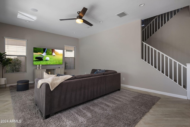 living room featuring ceiling fan