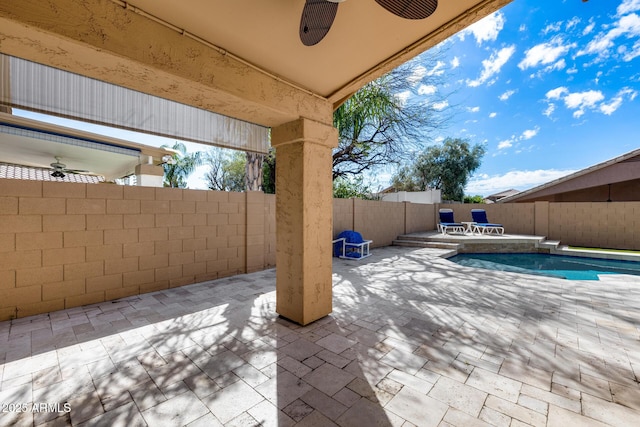9631 E Palm Ridge Dr, Scottsdale, AZ 85260 - fenced backyard with a ceiling fan and a patio