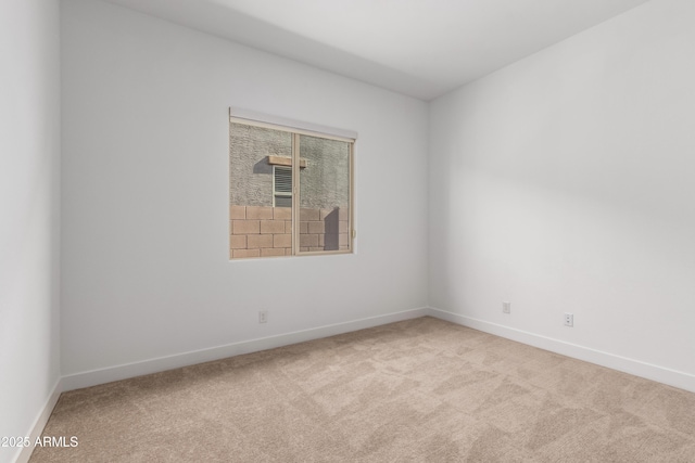 11015 E Texas Ave, Mesa, AZ 85212 - carpeted spare room featuring baseboards