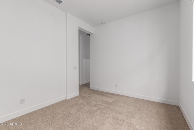 11015 E Texas Ave, Mesa, AZ 85212 - spare room with light carpet and baseboards